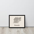Personalised pencil sketch dog portrait in black framed canvas leaning against a wall